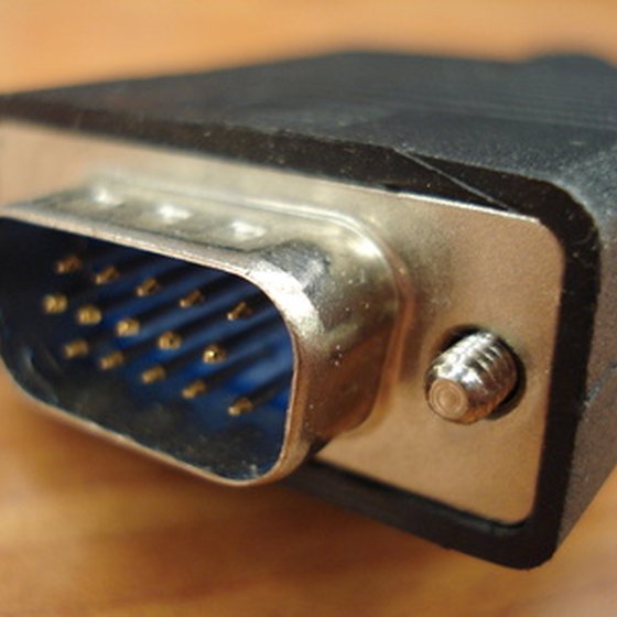 A VGA switchbox lets you plug two computers into one monitor.