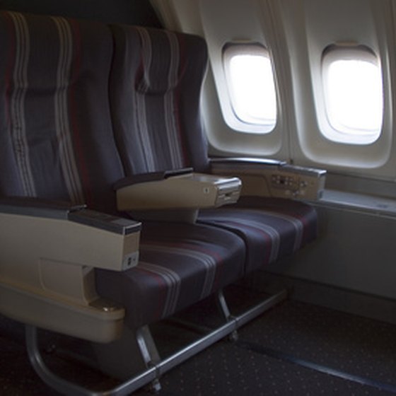There are numerous ways people can get free upgrades to first class during a flight.