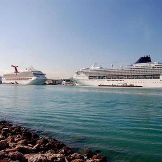 Cruise ships docked in the busy port of Miami, Carnival's home city.