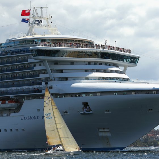 The Diamond Princess cruise ship sails through Sydney Harbor.