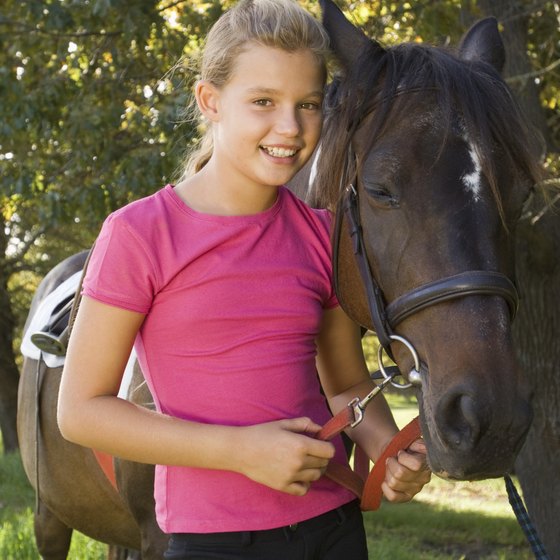 Kids enjoy pony rides at the The Mississauga Waterfront Festival.