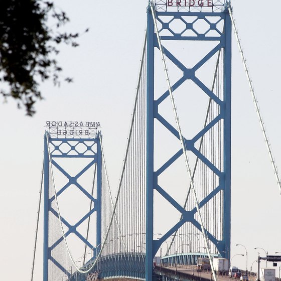 The Ambassador Bridge spans the Detroit River and separates Windsor from Detroit.