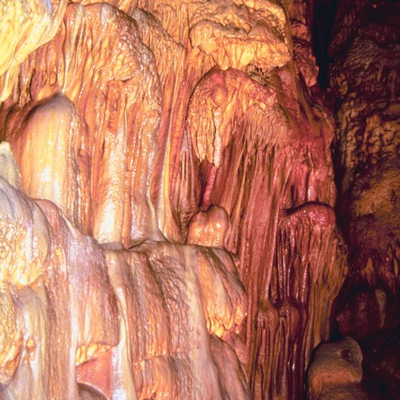 Underground caves in Barbados showcase limestone rock formations that are thousands of years old.