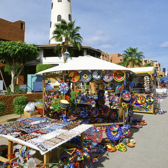 Visit markets in Cabo San Lucas to purchase Mexican handicrafts.