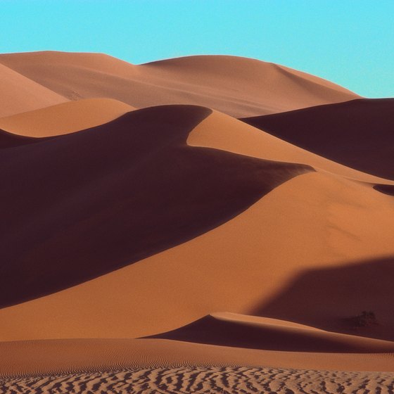 The miles of loose sand particles in the Sahara Desert are easily airborne during fierce winds.