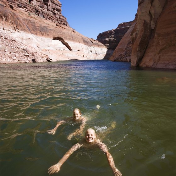 Watery canyons in Lake Powell have beaches for swimming and camping.