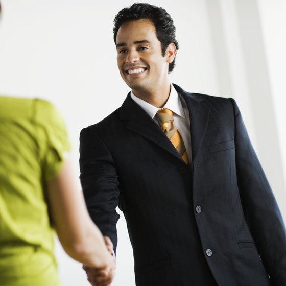 A smile and a handshake can begin the process of building relationships through appreciation marketing.