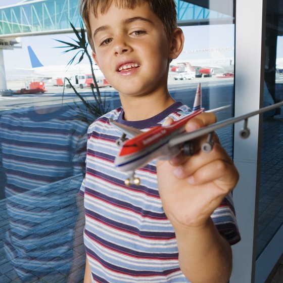 The age at which a child can buy a ticket depends on the airline's policy.