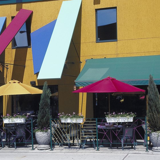 Canvas awnings in bright colors -- a great way to give a tropical feel to the exterior of your retail space.