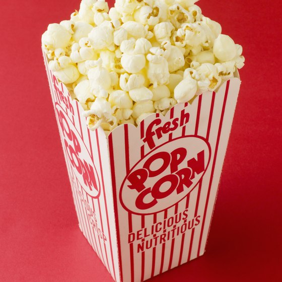 Add popcorn and beverages to a movie night to make it more fun.