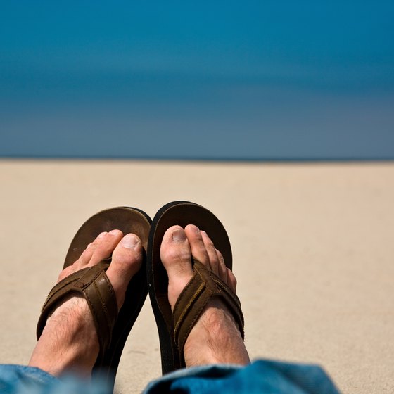 A pair of sturdy flip-flops keeps feet cool but protected from hot sand.