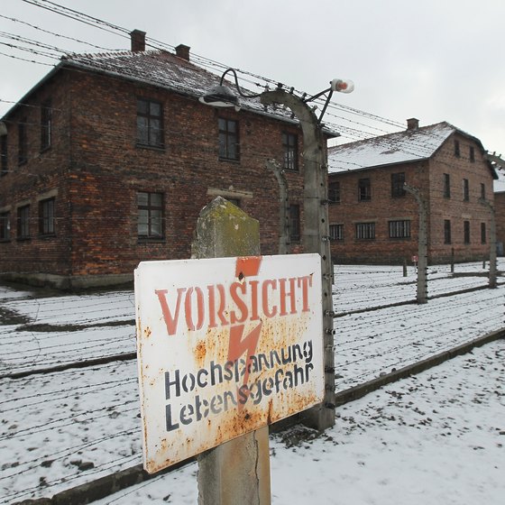"Careful High Voltage" reads a German sign at Auschwitz.