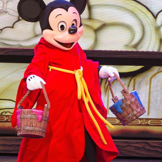 Mickey Mouse entertains visitors at all five global Disney resorts.