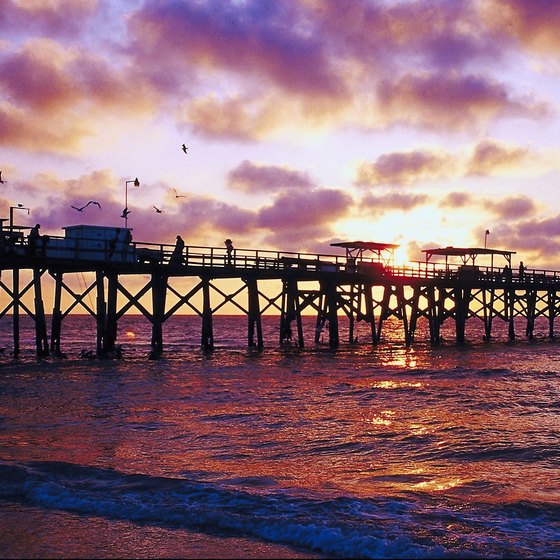 Florida's Gulf beach boardwalks are perfect places to watch a sunset.