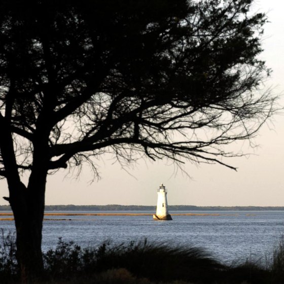 Tybee Island vistas include a lighthouse and salt marshes.