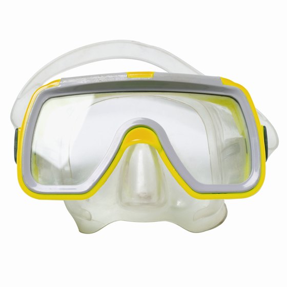 A dive mask won't correct vision, but those with corrective lenses will.