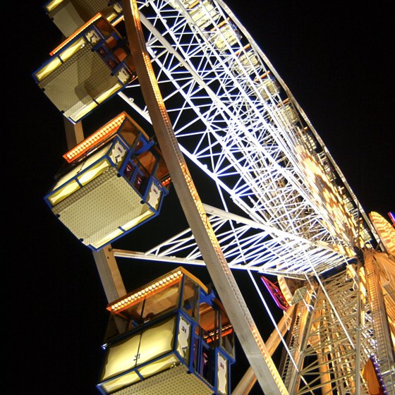 Rides such as the venerable Ferris wheel thrill Los Angeles County Fair visitors on Labor Day.