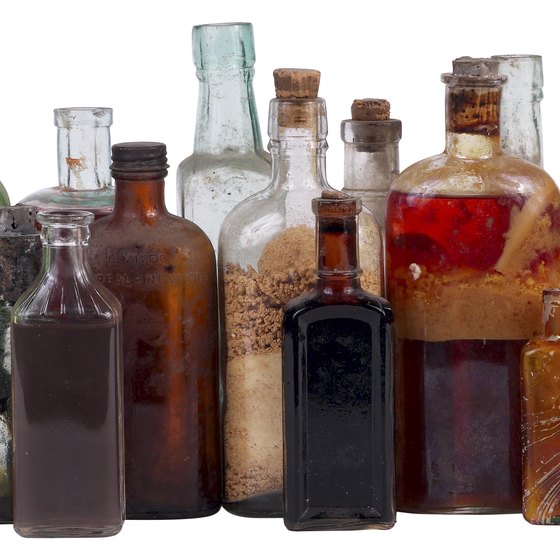 Attractive display of merchandise, like these antique bottles, attracts customers to your booth.