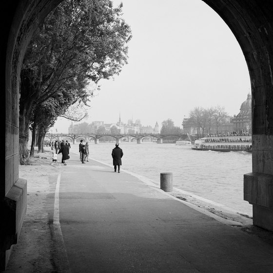 Pack layers to keep warm when walking along the scenic Seine river.