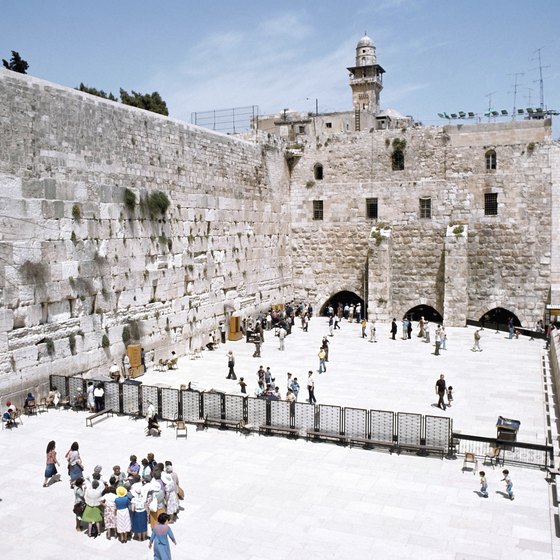 Many visitors to Israel pray at the Western Wall.