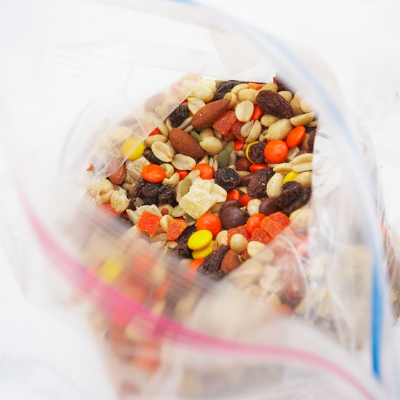 Seal food in plastic zip-close bags to prevent messes on the plane.