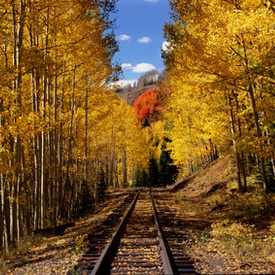 See the Rocky Mountains by train.