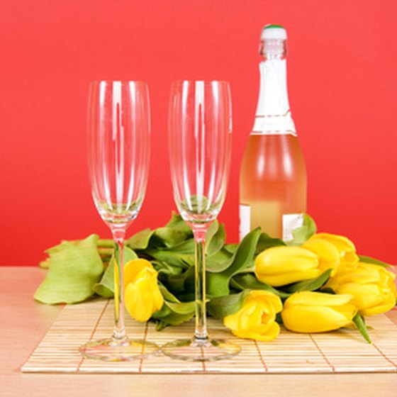 Romance vacations include a bottle of champagne or wine, and a rose or flower deliveries.