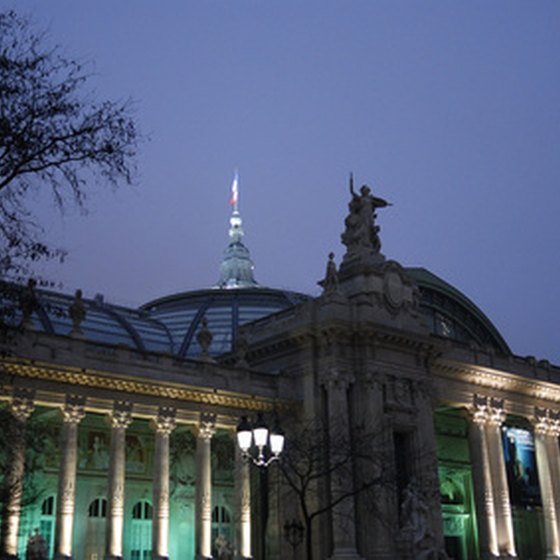 Paris at night reveals the city's famous landmarks illuminated in floodlights.