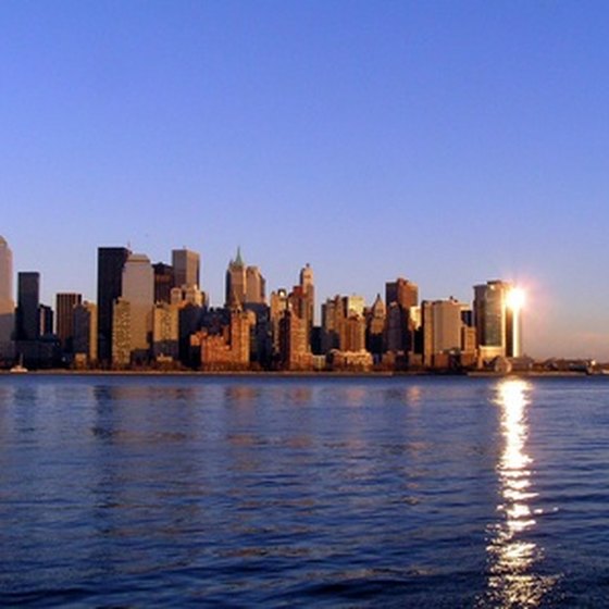 See the sun set over Manhattan on an evening cruise around New York Harbor.
