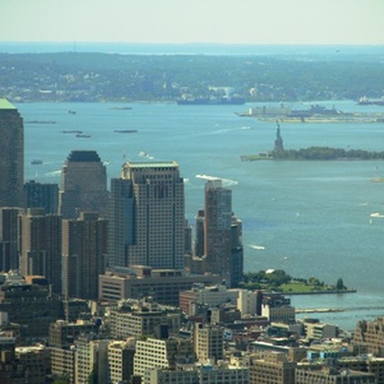 Ellis Island and the Statue of Liberty with Manhattan skyscrapers.