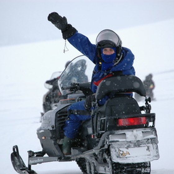 Bundle up for snowmobiling in Breckenridge.