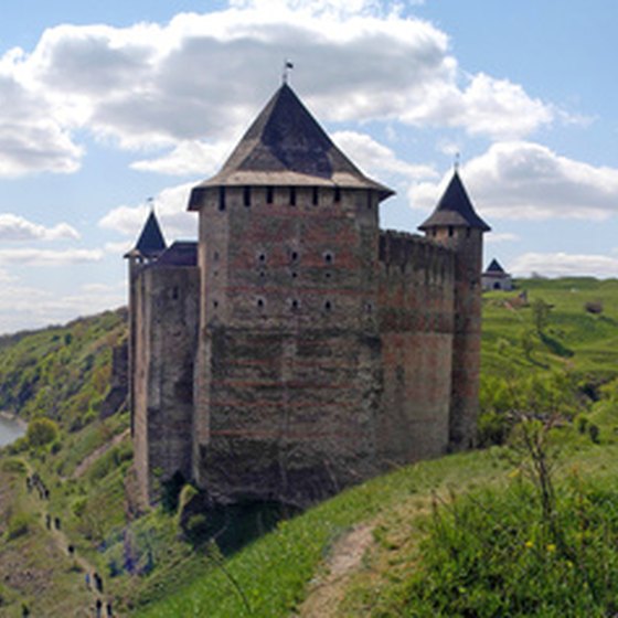 Traveling by train is the preferred method in Ukraine, where riders pass such landmarks as this 13th-century castle in Khotin.
