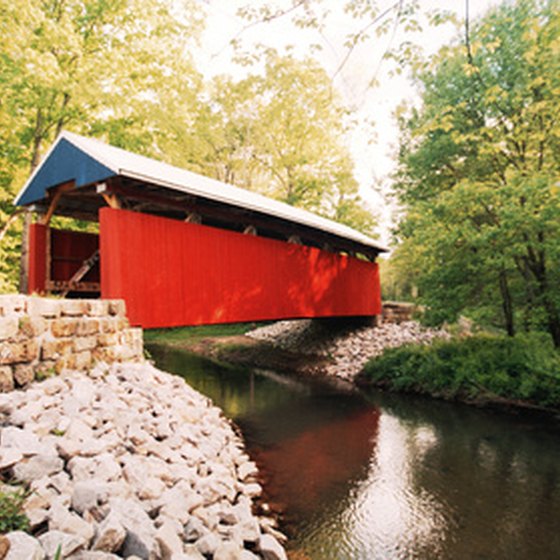 Take a scenic drive through a covered bridge like this one.
