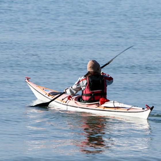 Kayaking is a great way to explore the flooded slot canyons of Lake Powell.