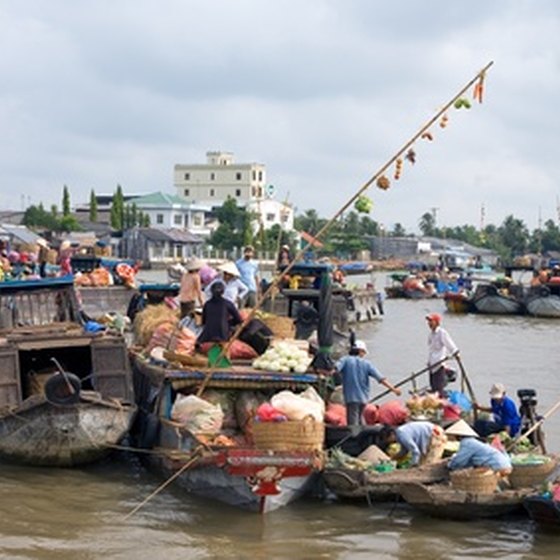 Buyers and sellers meet at a floating market in the Mekong Delta region.