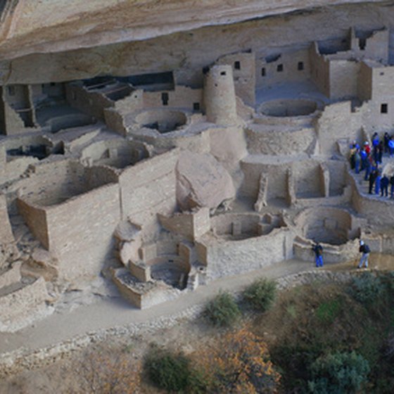 In summer, park rangers guide visitors through the cliff dwellings.