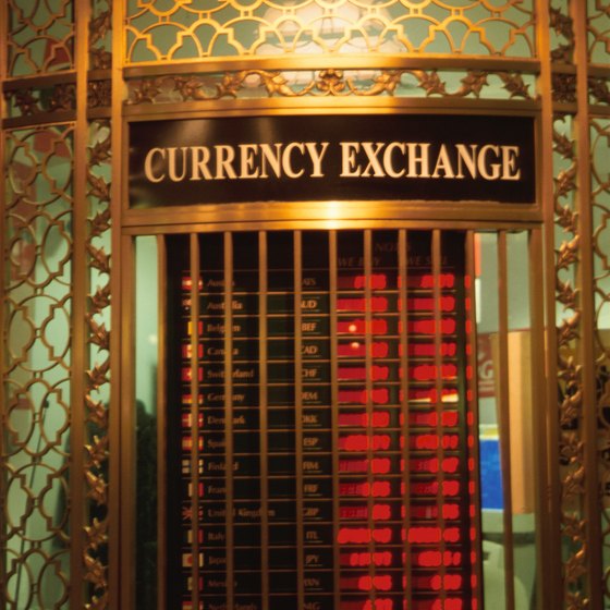 Current exchange rates are listed at the foreign exchange facility.