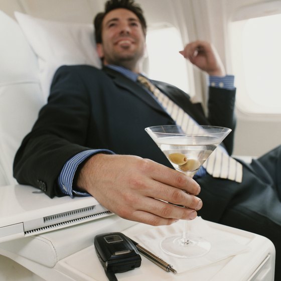 Enjoy a free adult beverage in first class.