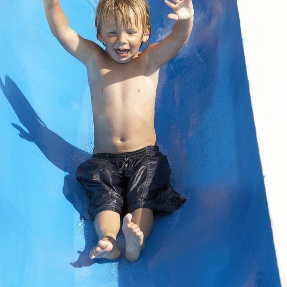 Treat your child to a trip down a water slide.