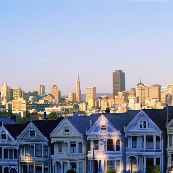 A new day begins as the sun rises over Victorian homes.