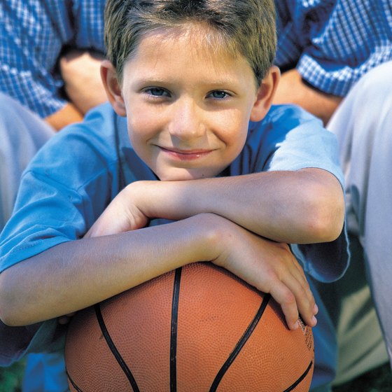 Kids develop basketball skills at camps.