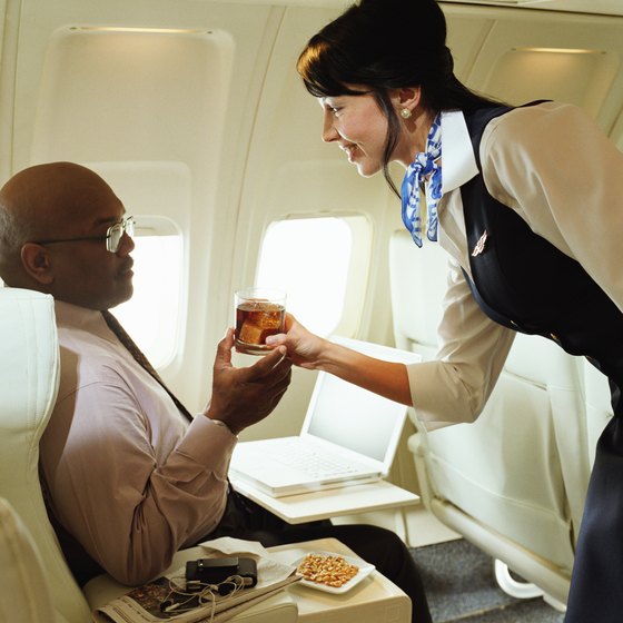 Business class travelers often receive complementary services aboard the plane.