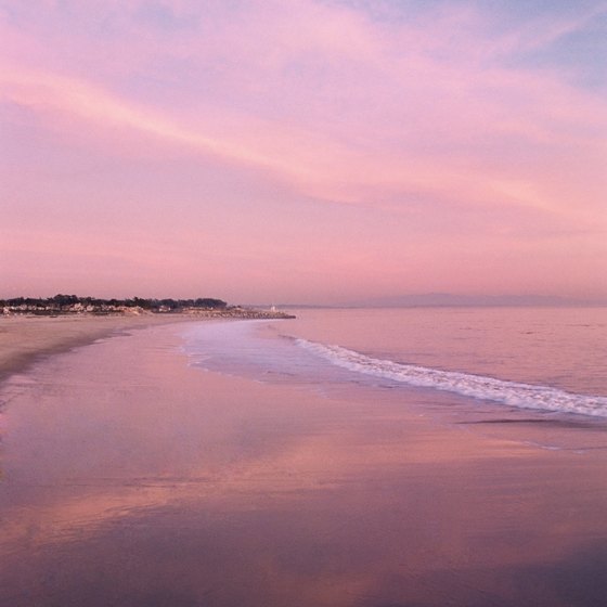 Catch a picturesque Pacific sunset at one of the beaches in Surf City, USA.