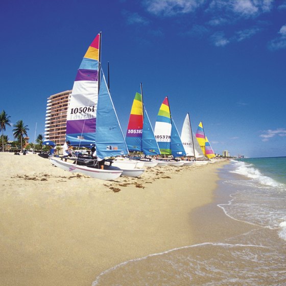 Catamarans rest on a Fort Lauderdale beach, just 10 minutes from Davie.