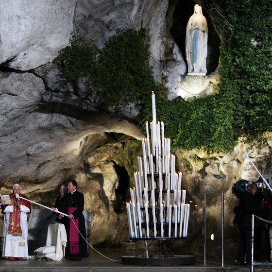 The Grotto of Massabielle at Lourdes attracts nearly six million visitors annually.
