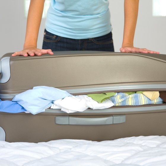 An oversized suitcase is subject to additional fees by airlines.