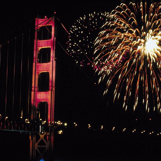 Fireworks explode over the Golden Gate Bridge in San Francisco on the Fourth of July.