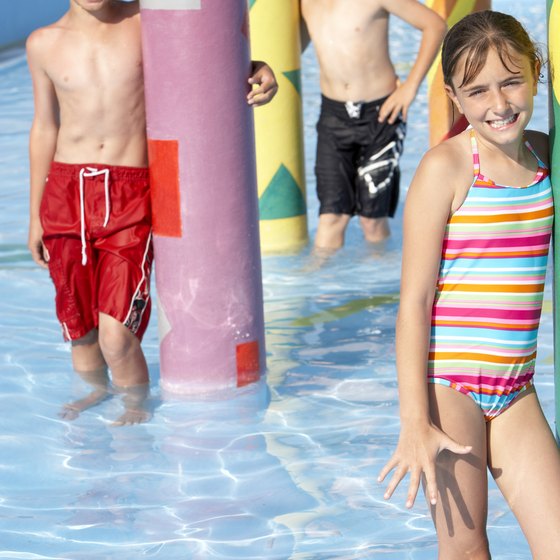A hotel or resort with a waterpark keeps kids entertained during down time.