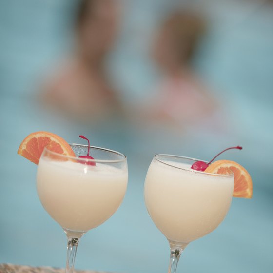 Enjoy pina coladas by the pool included with most all-inclusive Mexican vacations.