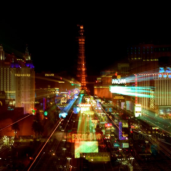 An illustration of a woman with her hands at her temples and a question mark above her head, symbolising the question of when is the cheapest time to visit Las Vegas.